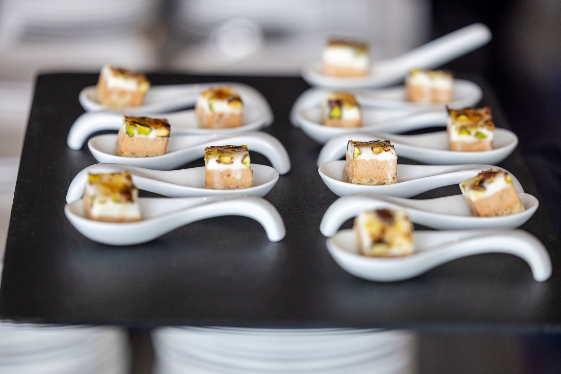 Elegant Appetizer Bites in Ceramic Serving Spoons